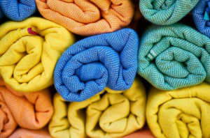 stock photo of rolled up towels stacked used for dog enrichment